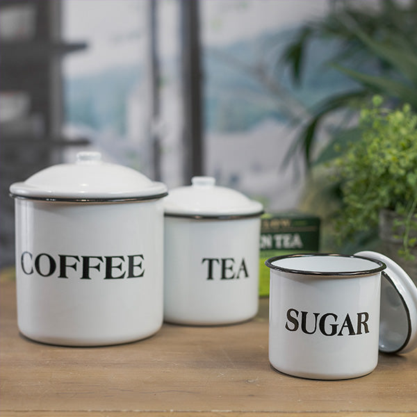 Rustic enamel coffee cup with word coffee on it and decorative