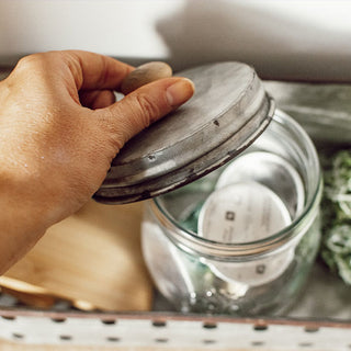 Three Glass Canisters with Storage Bin